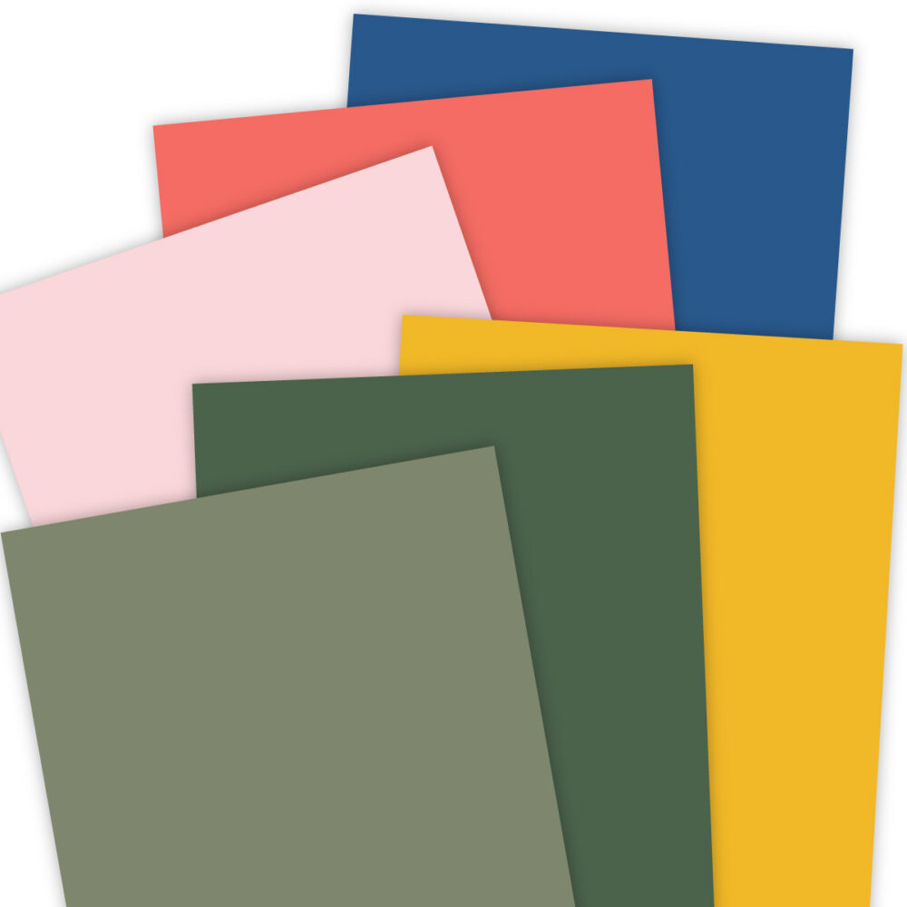 Overlapping colored sheets of paper in blue, red, pink, yellow, green, and olive tones.