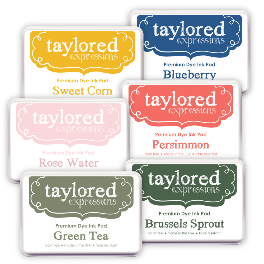 Six Taylored Expressions dye ink pads in Sweet Corn, Blueberry, Rose Water, Persimmon, Green Tea, and Brussels Sprout.